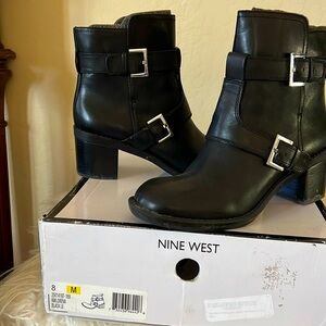 Cute and comfortable Nine West bootie with silver buckles.  Slip on. Size 8